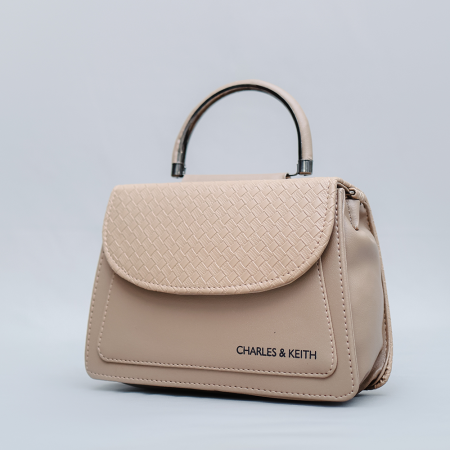 Charles & Keith Beige Textured Handbag – Elegant & Stylish